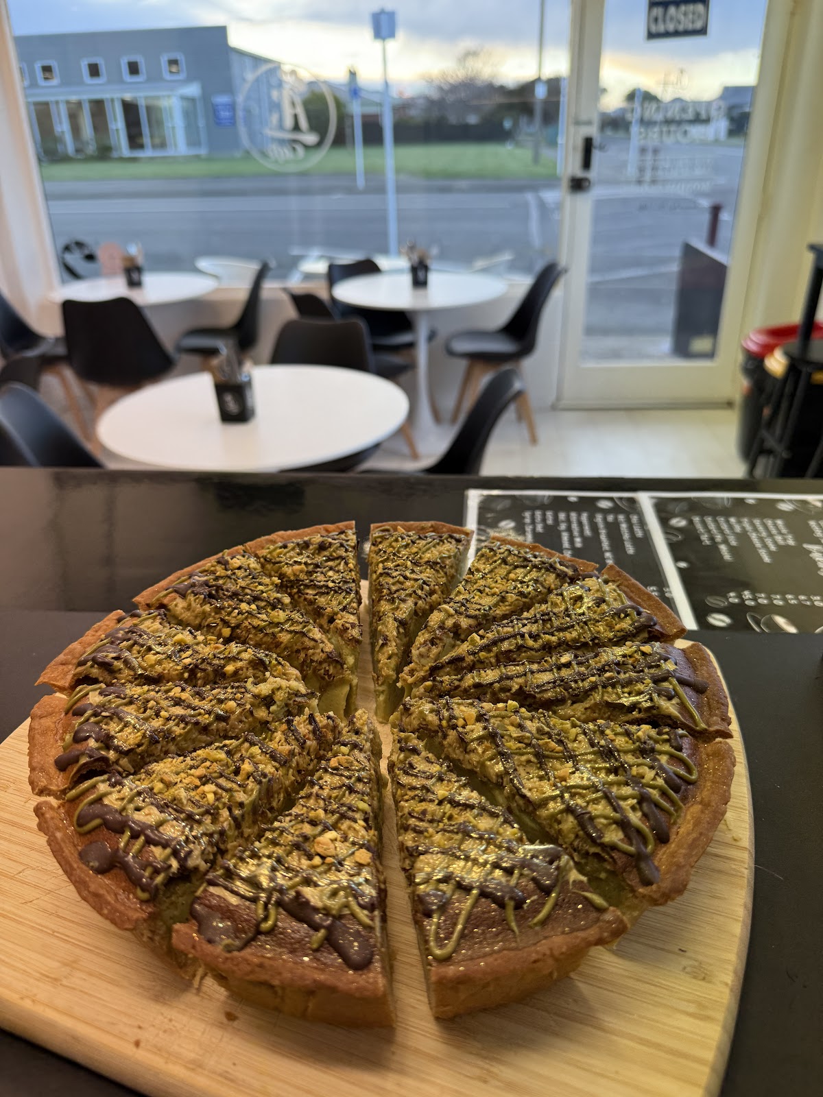 Whole pistachio tart cut into slices
