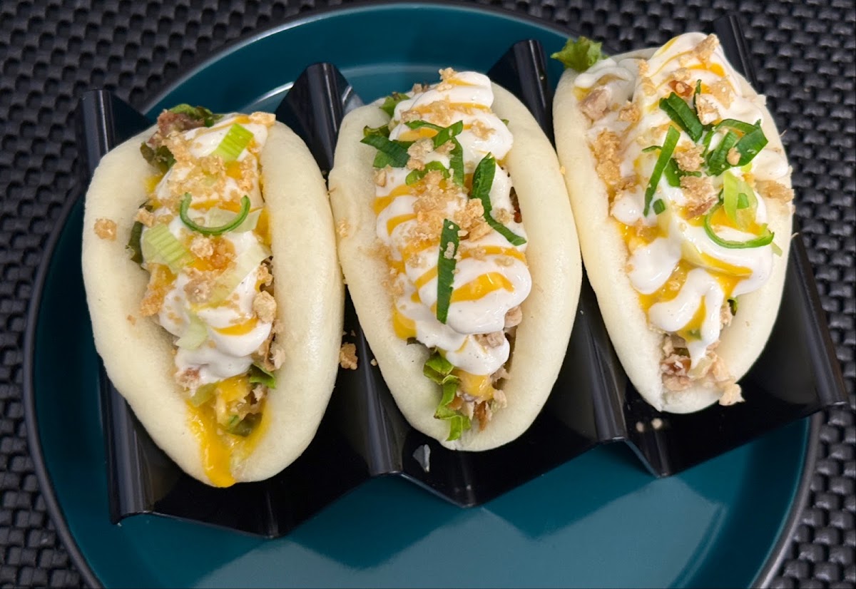 Trio of chicken sisig bao buns